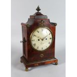 A GEORGE III MAHOGANY BRACKET CLOCK, the case with ormolu finial and mounts, the circular dial