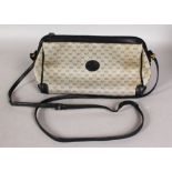 A VINTAGE 1980'S GUCCI NAVY AND GREY MONOGRAM GG SHOULDER BAG.