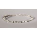 A 14CT WHITE GOLD TENNIS BRACELET, 2.5CTS.