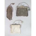 THREE EDWARDIAN SILVER MESH EVENING BAG.