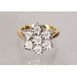 A GOOD 9CT GOLD DIAMOND CLUSTER RING of approx. 1ct.