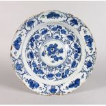 AN 18TH CENTURY DELFT TIN GLAZE BLUE AND WHITE CIRCULAR DISH. 14ins diameter.