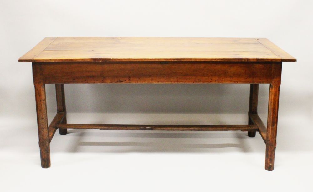 A GOOD 18TH/19TH CENTURY FRENCH FRUITWOOD FARMHOUSE TABLE, with cleated triple plank top, a drawer