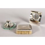 A SILVER BACKED HAIRBRUSH, SILVER INKPOT AND JASPER CONRAN CLOCK (3).