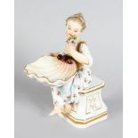 A GOOD SMALL 19TH CENTURY MEISSEN PORCELAIN FIGURE OF A YOUNG GIRL, seated on a plinth and holding a