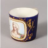 A 19TH CENTURY SEVRES SMALL MUG painted with a Lady, perhaps Marie Antoinette, in a jeweled panel