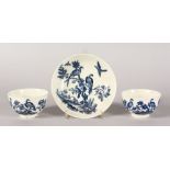 TWO VARIOUS WORCESTER BLUE AND WHITE TEA BOWLS and A SAUCER decorated with birds (3).