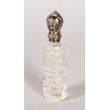 A CUT GLASS SCENT BOTTLE with silver top with key pattern engraving. 3.75ins.