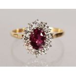 A 14CT YELLOW GOLD, RUBY AND DIAMOND CLUSTER RING, 2CTS.