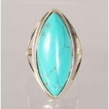 A SILVER TURQUOISE RING.