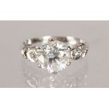 A 2.5CT DIAMOND RING, Sl Clarity, G/H Colour, with diamond shoulders set in 18ct white gold.