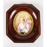 AN OVAL IVORY OF A LADY. 3ins x 2.25ins, in an inlaid octagonal frame.