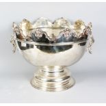 A VERY LARGE PLATE MONTEITH BOWL with shaped rim and lion ring handles. 14ins high, 17ins diameter.