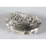 A CONTINENTAL SILVER SHAPED SNUFF BOX, the lid with figures. 2.75ins.