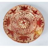 A PORTUGUESE LUSTRE CIRCULAR PLAQUE. 15ins diameter.