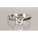 A WHITE GOLD PRINCESS CUT SINGLE STONE RING of 70pts.