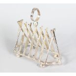 A PLATED "CRICKET" TOAST RACK with six pairs of crossed bats and two wickets.