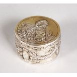 A SMALL CIRCULAR BOX AND COVER, the top with Louis XVI in relief, ribbons and garlands to the sides.