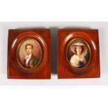 A PAIR OF OVAL MINIATURES of A YOUNG LADY AND MAN. Monogrammed H.B. 3.25ins x 2.5ins, in wooden