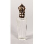 A CUT GLASS SCENT BOTTLE with silver top with key pattern engraving. 3ins.
