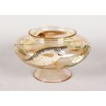 A CONTINENTAL CIRCULAR BOWL, the sides decorated with fish and lilies in enamels. 8ins diameter,