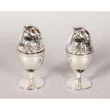 A SMALL PAIR OF "CHICK" EGG CUPS.