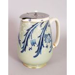 A MCINTYRE MOORCROFT WATER JUG with plated lid. 6.5ins high.