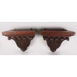 A GOOD PAIR OF CARVED WOOD WALL BRACKETS of ISLAMIC FORM. 1ft 5ins long, 1ft 3ins high.