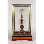 A LARGE SKELETON CLOCK, with white enamel dial and "scissor" movement, in a glass case, with a