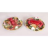 A PAIR OF PALISSY CIRCULAR PLATES, CRAB, LOBSTER, ETC. 9ins diameter.