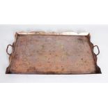 A SILVER INLAID TWO-HANDLED RECTANGULAR TEA TRAY. 21ins long.