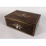 A SUPERB INLAID COROMANDEL WRITING BOX inlaid with mother-of-pearl and brass liners. 14ins long.