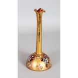 A MOSER GILT DECORATED RUBY BULBOUS VASE enamelled with flowers. 8ins high.