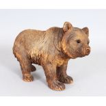 A GOOD CARVED BLACK FOREST BEAR. 9ins long.