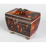 A GOOD SMALL REGENCY TORTOISESHELL TWO-DIVISION TEA CADDY, with octagonal shaped top, plain sides