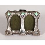 A SMALL ART NOUVEAU STYLE SILVER AND ENAMEL DOUBLE PHOTOGRAPH FRAME. 4.5ins wide x 3ins high.