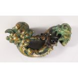 A CAST BRONZE DOOR KNOCKER, modelled as a mythological beast. 7ins high.