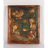 AN 18TH/19TH CENTURY CARVED, PAINTED AND GILDED PANEL, depicting Joseph and Mary with the infant