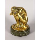 ADAM JOSEPH POHL (1872-1930) A GILT BRONZE RESTING NUDE, 5.5ins high, on a marble base. Signed A.