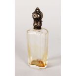 A CUT GLASS SCENT BOTTLE with silver top with key pattern engraving. 3.75ins.