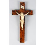 A GOOD QUALITY CARVED IVORY CRUCIFIX on a wooden tortoiseshell cross. 13ins long.