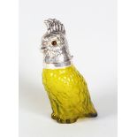 A NOVELTY YELLOW GLASS PARROT CLARET JUG with plated mounts and glass eyes. 10ins high.
