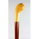 A WALKING STICK with carved IVORY HANDLE.