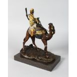 AFTER AGATHON LEONARD (1841-1925) FRENCH A GOOD PAINTED COLD CAST BRONZE ARAB RIDING A CAMEL. Signed