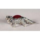 A SILVER FOX PIN CUSHION.