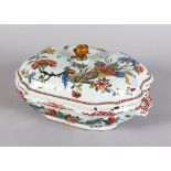 AN 18TH CENTURY ROUEN TIN GLAZE TUREEN AND COVER with polychrome decoration. 10ins long.