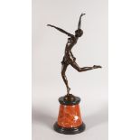 AN ART DECO STYLE BRONZE OF A DANCING LADY, on a circular marble base. 2ft 2ins high.