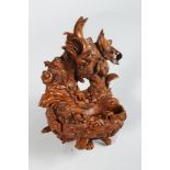 A LOVELY CARVED BLACK FOREST BIRDS NEST WALL POCKET. 5.5ins.