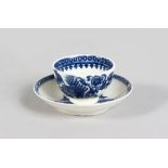 A MINIATURE SALOPIAN BLUE AND WHITE WILLOW PATTERN DESIGN TEA BOWL AND SAUCER, CIRCA. 1780.