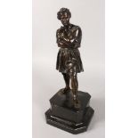 AFTER THE ANTIQUE (19TH CENTURY) A CLASSICAL STANDING MALE FIGURE, with arms crossed. 14ins high, on